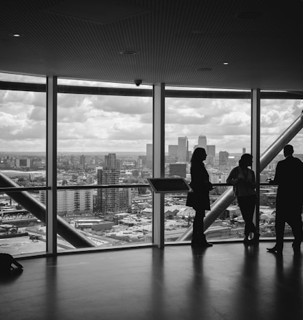 people standing inside city building