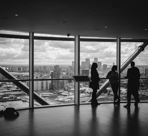 people standing inside city building