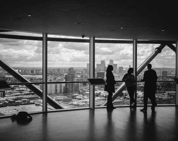 people standing inside city building