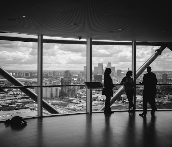 people standing inside city building