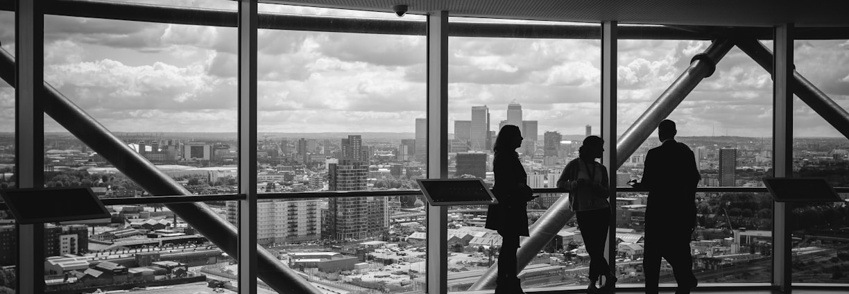 people standing inside city building