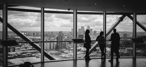 people standing inside city building
