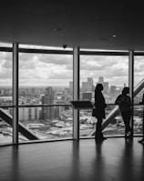 people standing inside city building