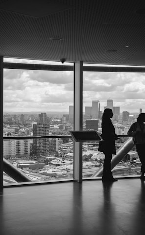 people standing inside city building