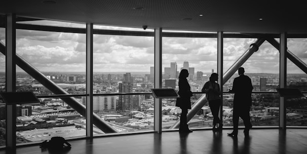 people standing inside city building