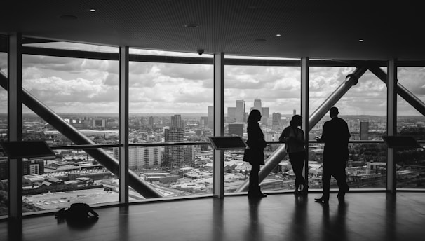 people standing inside city building