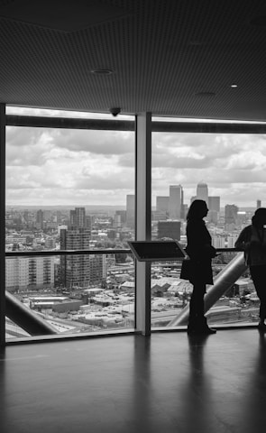 people standing inside city building