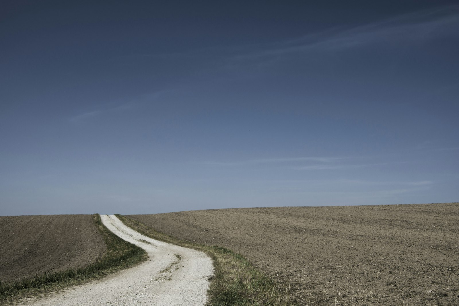 Sony 28-75mm F2.8 SAM sample photo. Narrow road in between photography