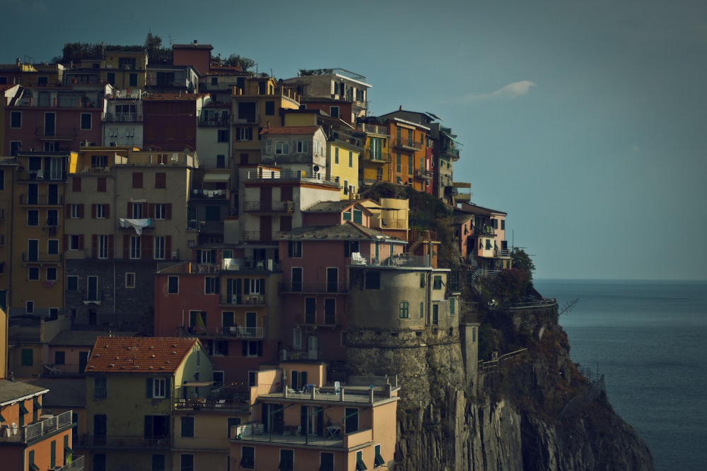 landscape photography of houses on mountain