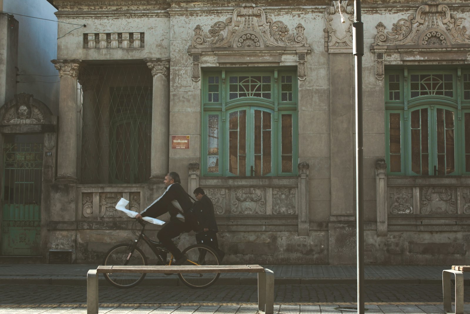 Canon EOS 50D + Canon EF-S 18-55mm F3.5-5.6 IS sample photo. Man riding bicycle on photography