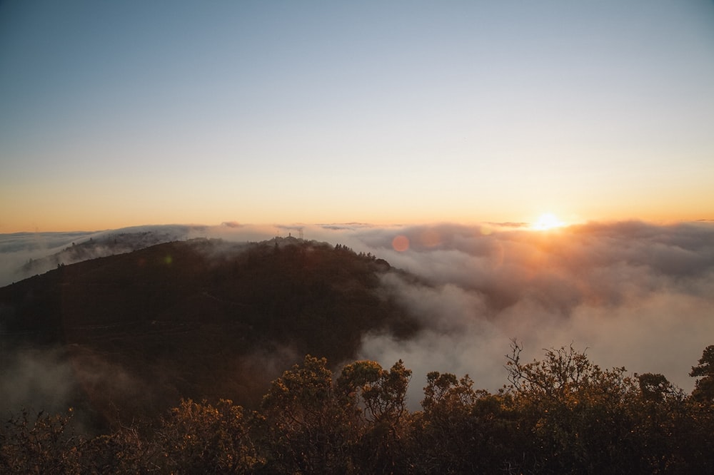 aerial photography of foggy mountain