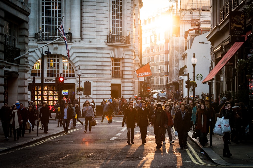 group of people standing at city