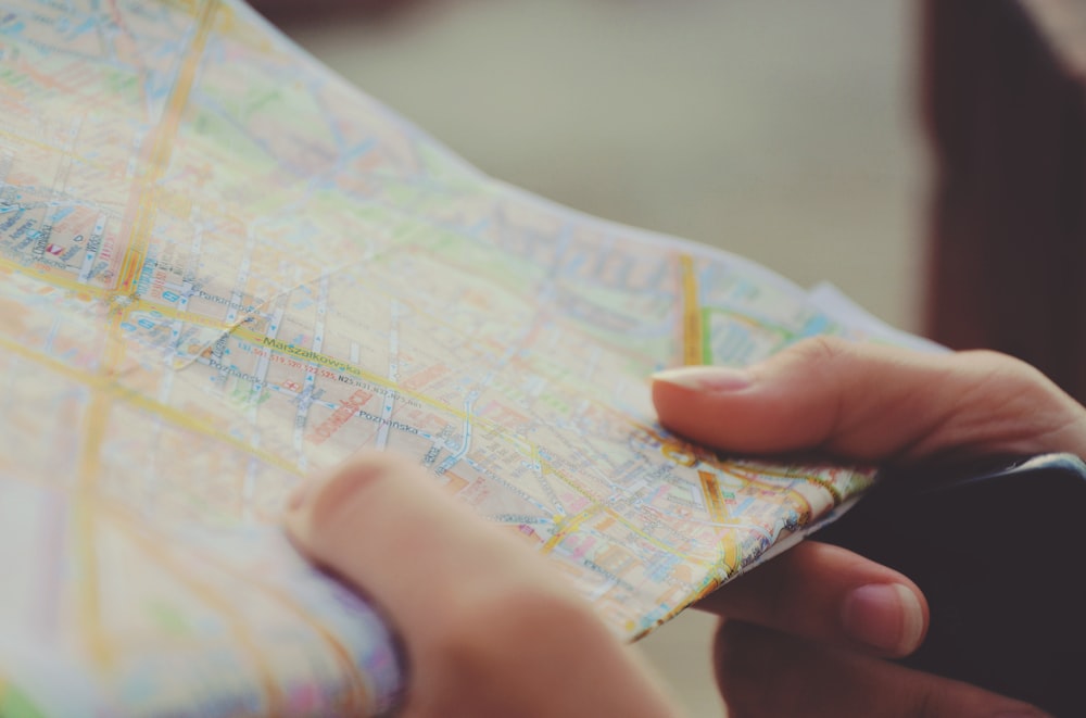 person holding map