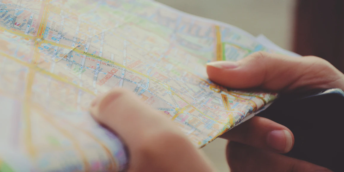 person holding map