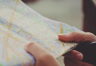 person holding map