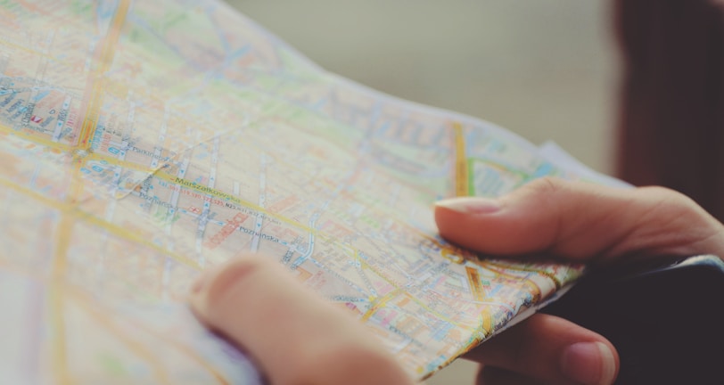 person holding map