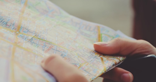 person holding map