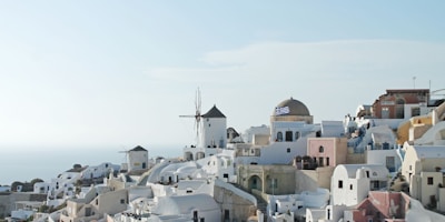 concrete buildings at Santorini, Greece during daytime