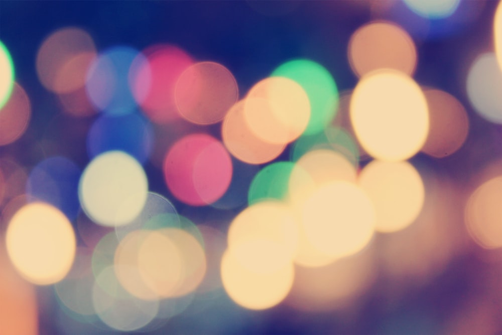 A colorful bokeh effect against a black background