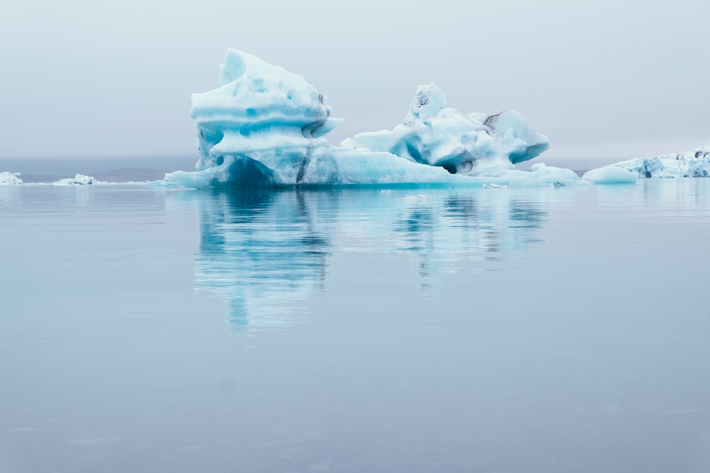 white icebergs on water