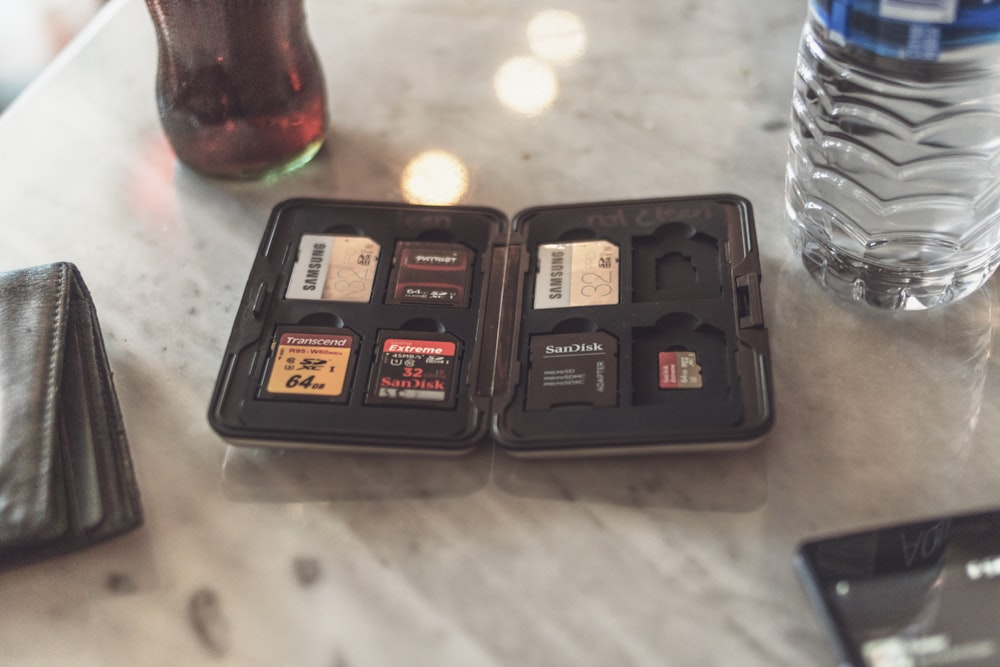 black plastic container on white table