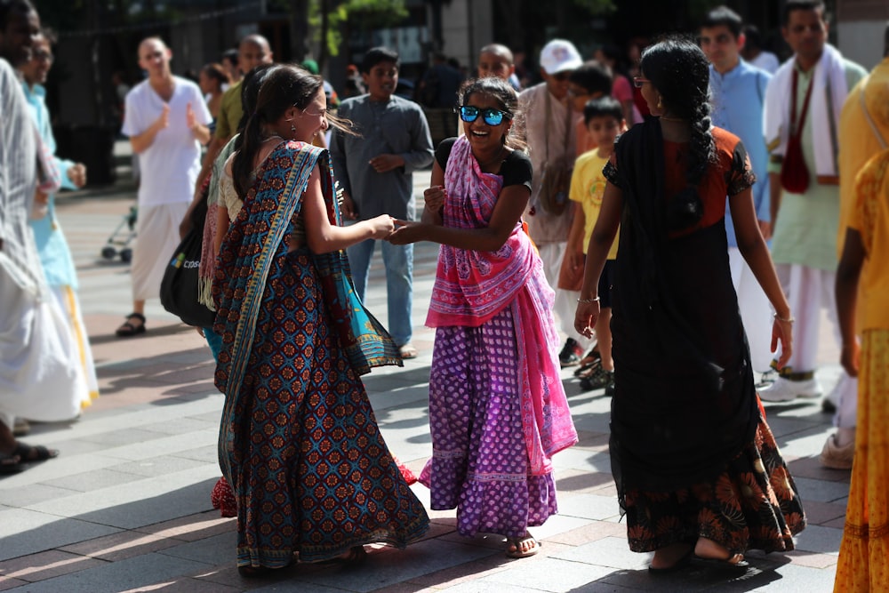 two women holding hands