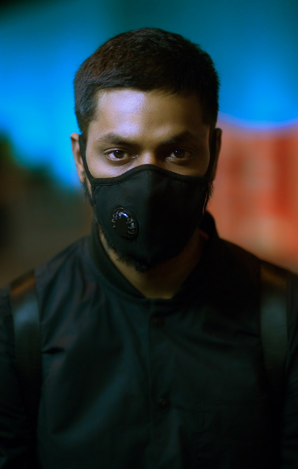 man wearing black mask