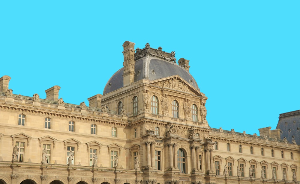 brown concrete building on green sky