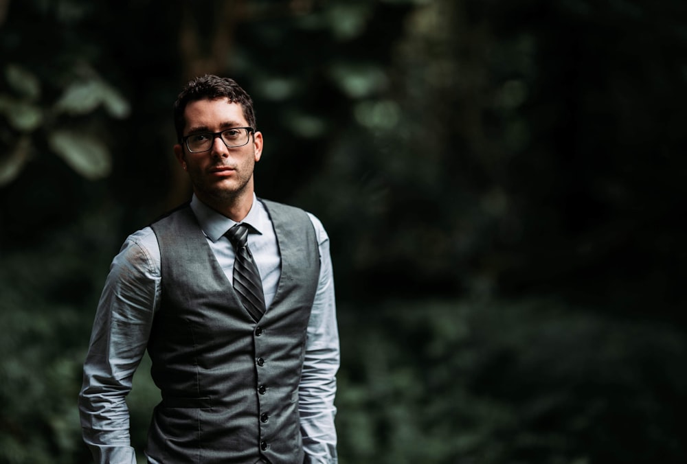 man wearing gray suit vest during daytime