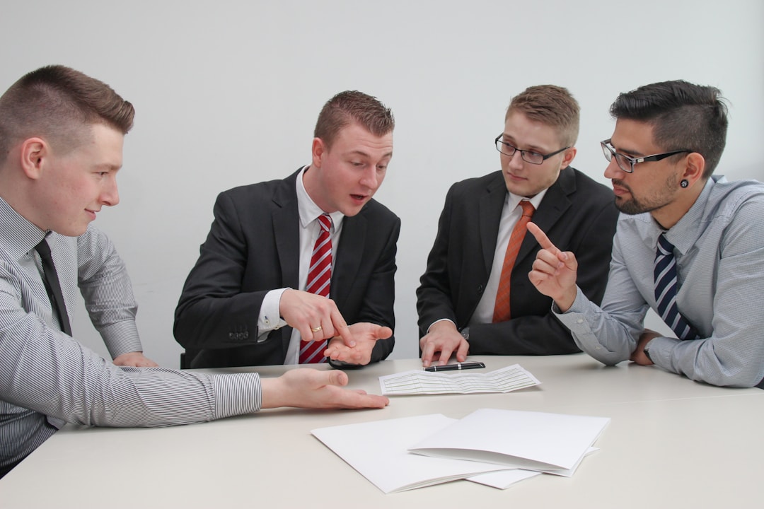 diverse group reviewing investment portfolio together