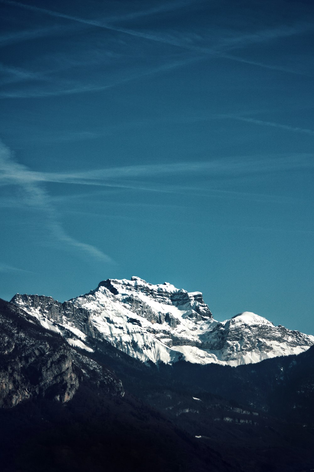 snow covered mountain with blue sky during daytime