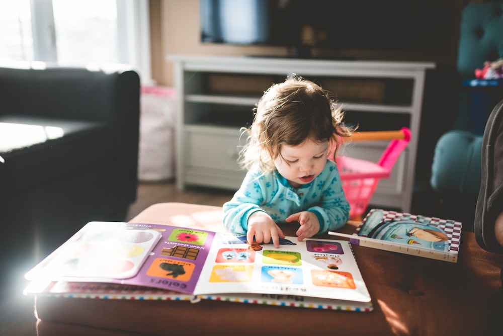 child reading book