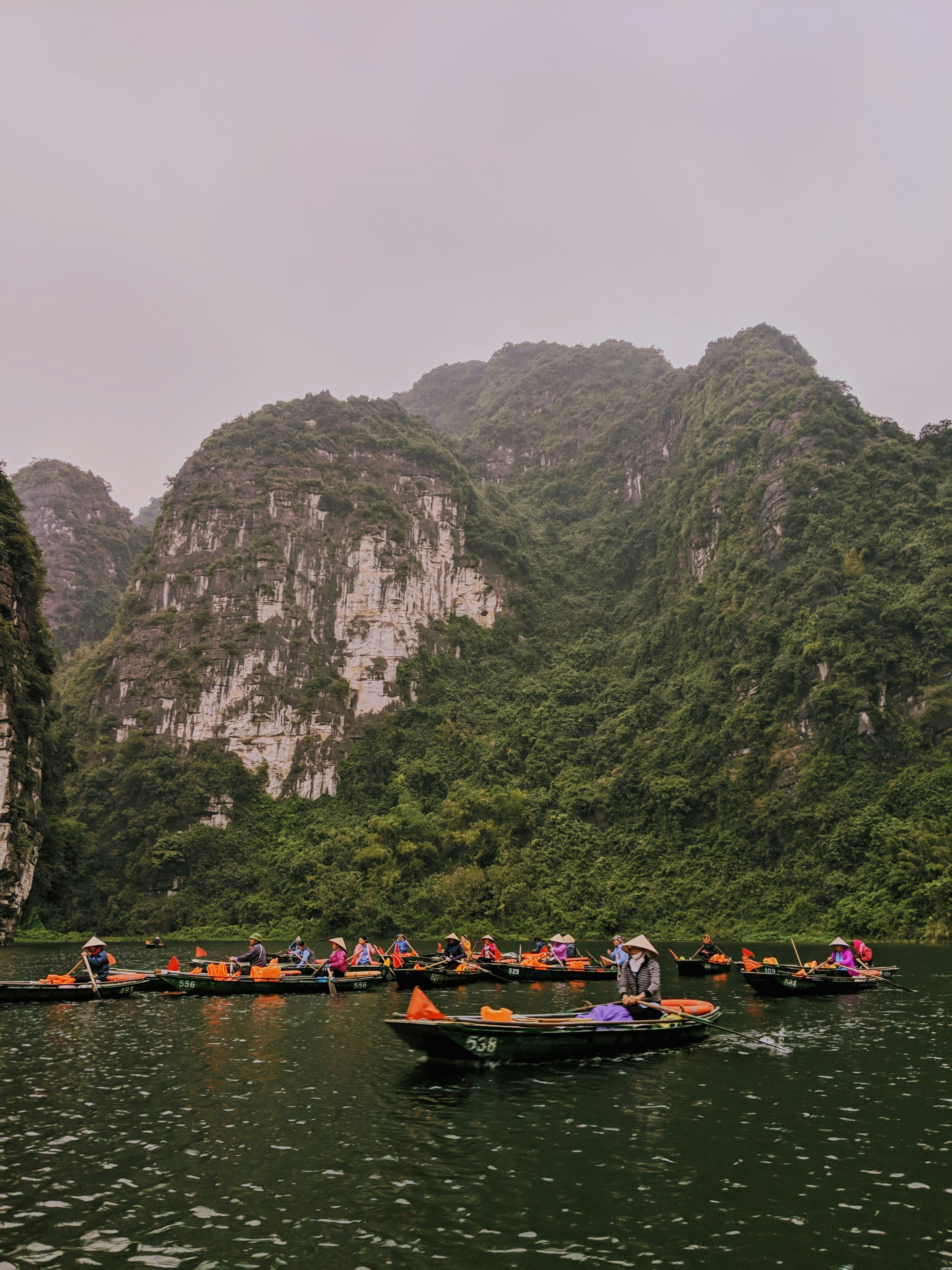Boat tour through caves in Trang An