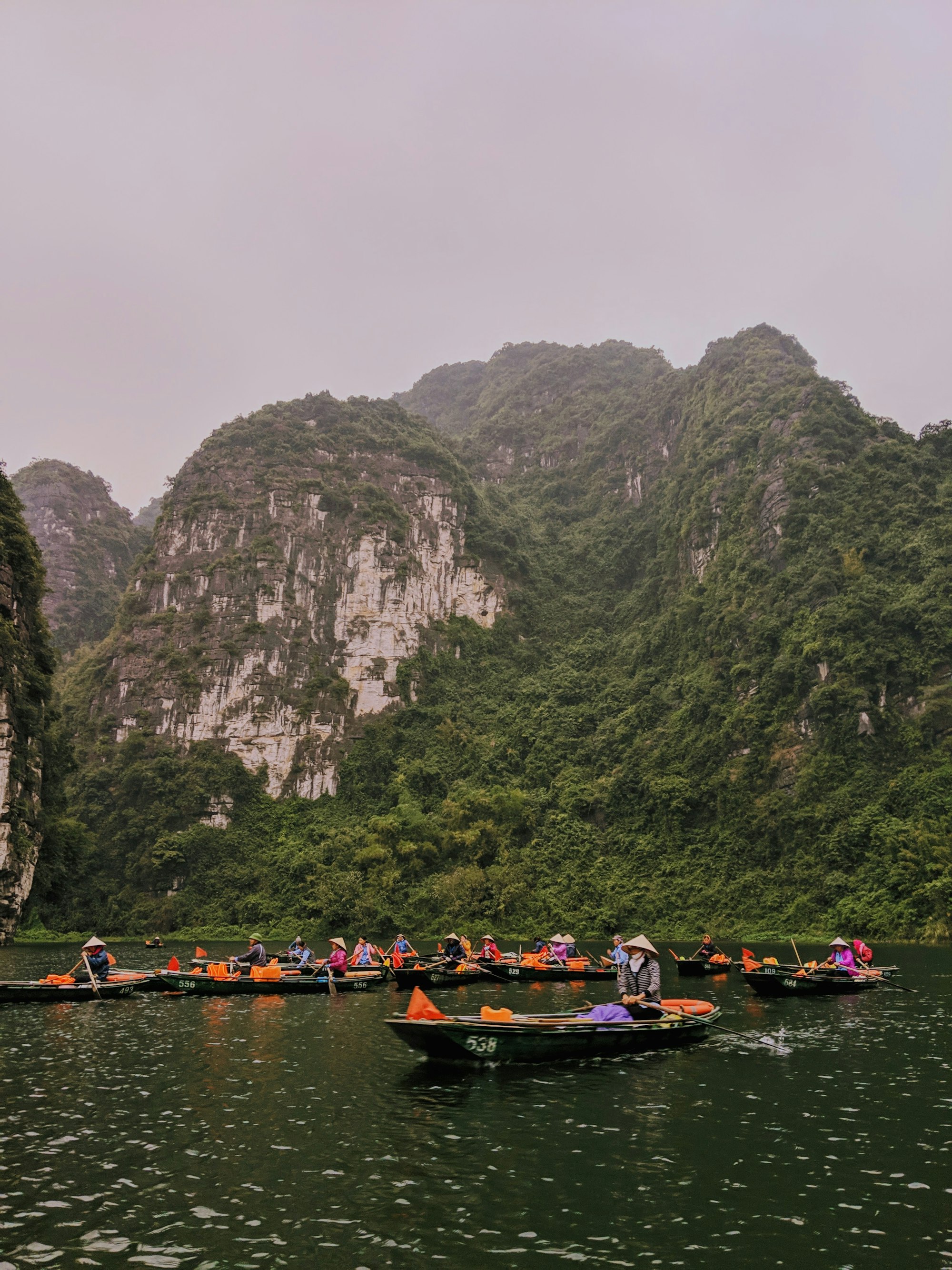 Boat tour through caves in Trang An
