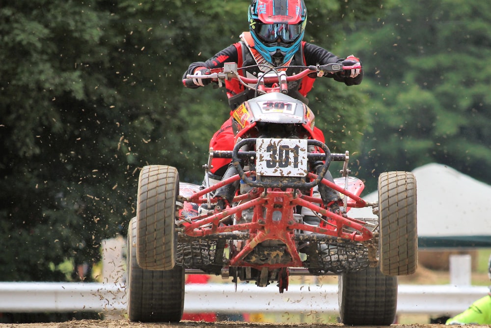 man riding ATV