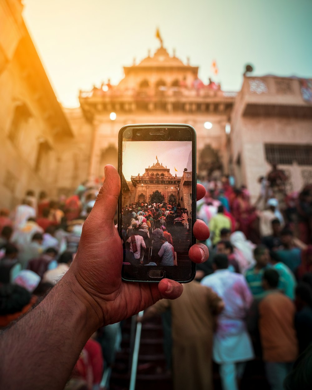 person holding black Android smartphone