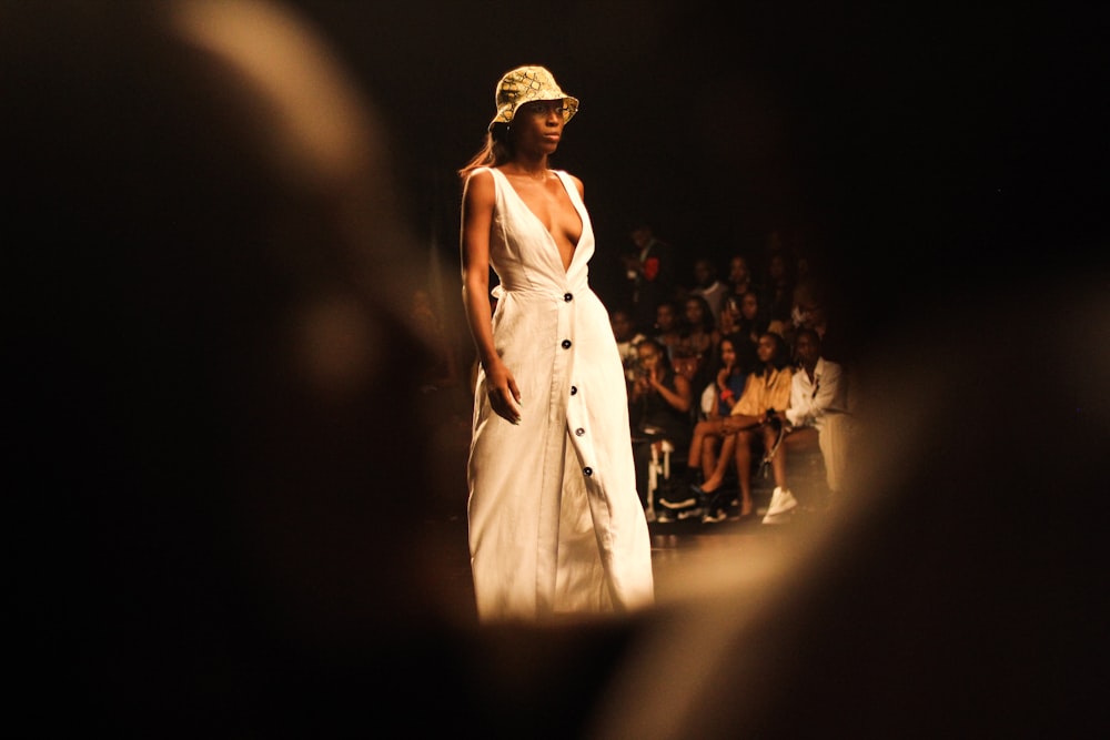 woman wearing white sleeveless dress