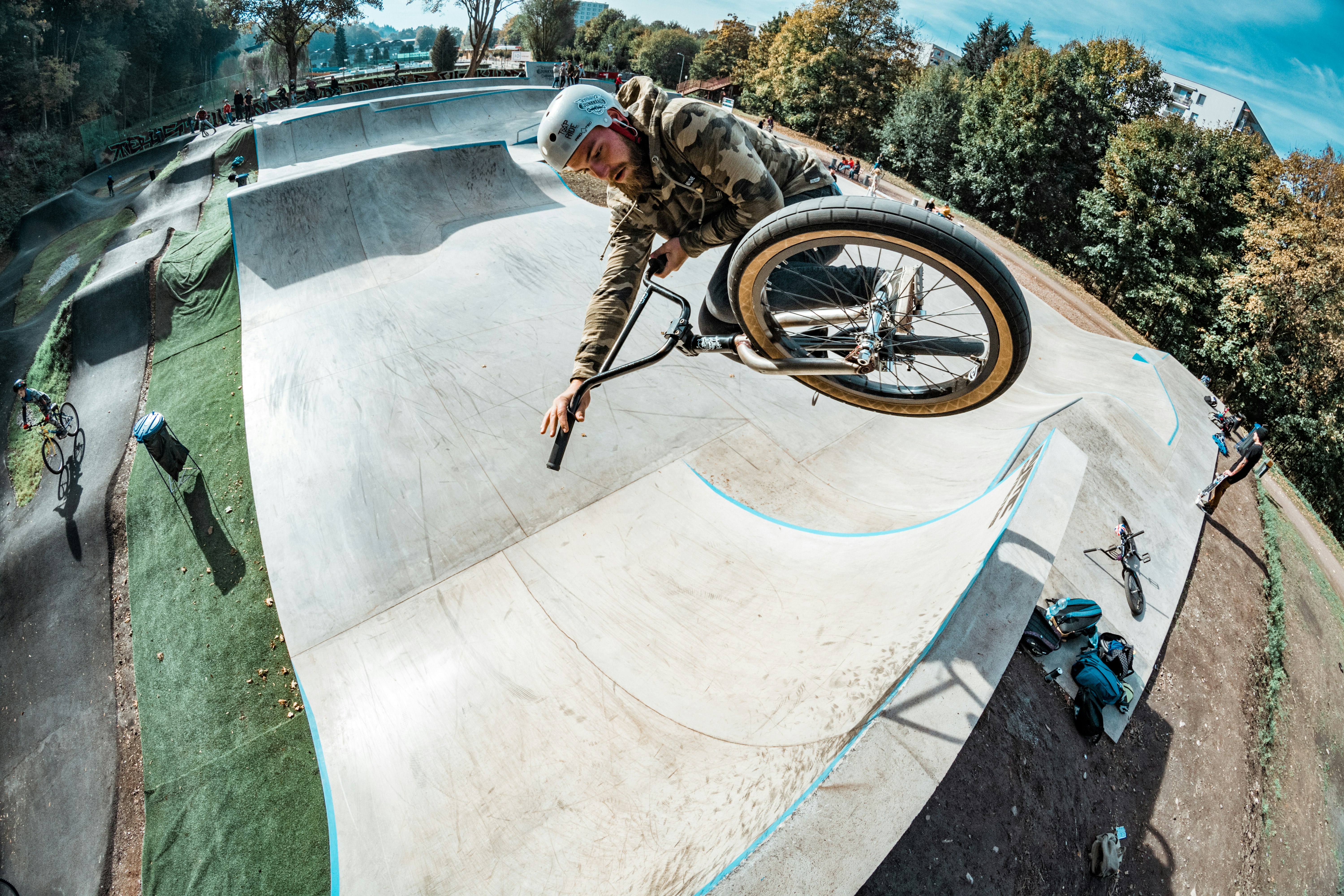 man riding BMX bike during daytime