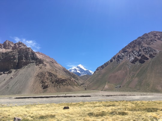 gray field beside mountain in Las Heras Department Argentina