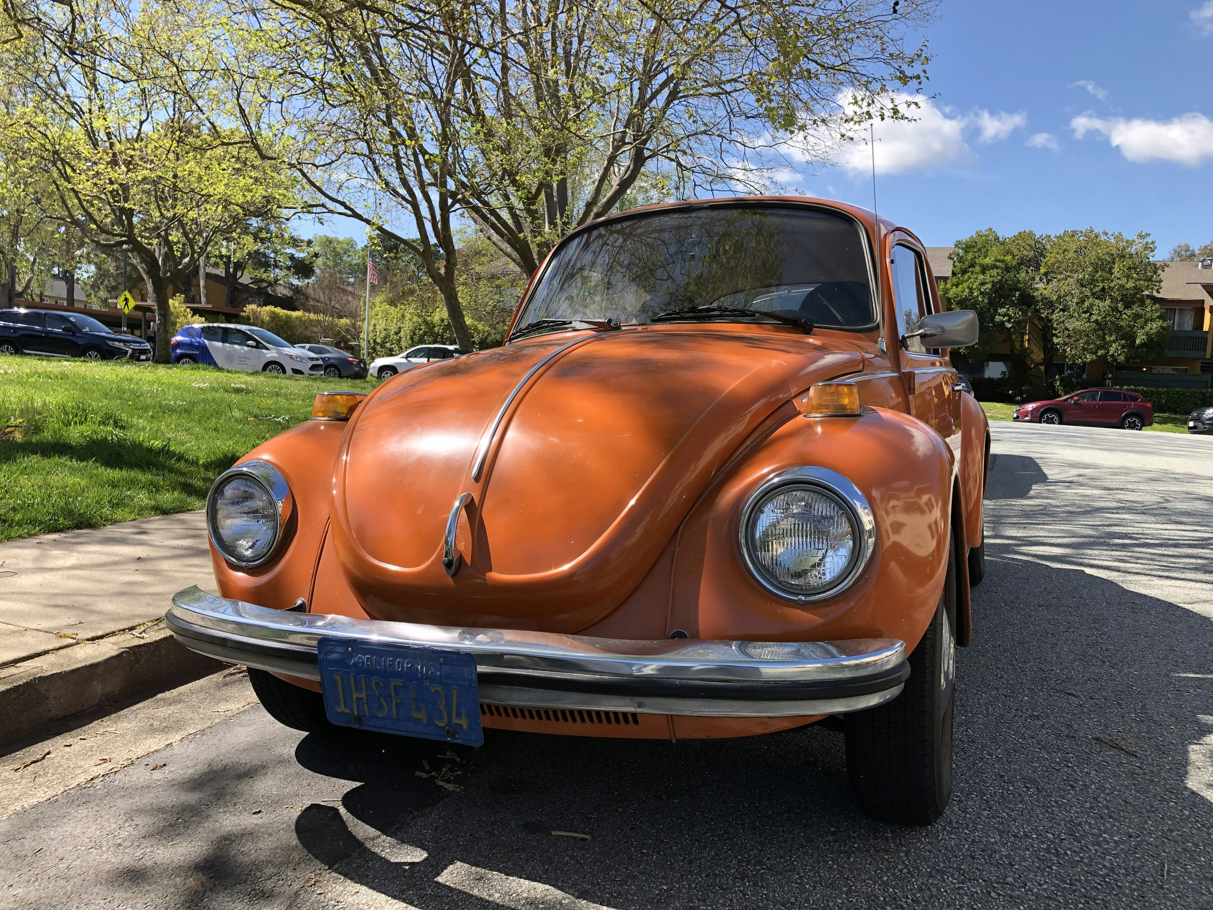 orange Volkswagen beetle