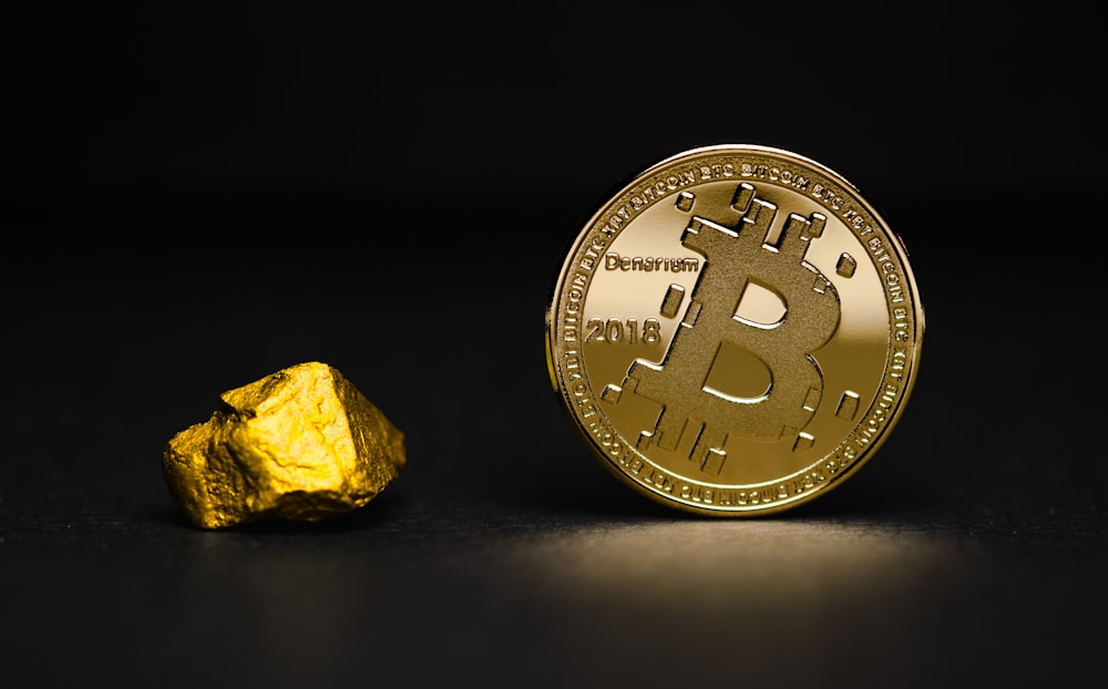 round gold-colored bit coin