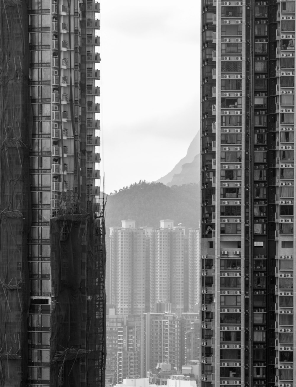 grayscale photography of high rise buildings