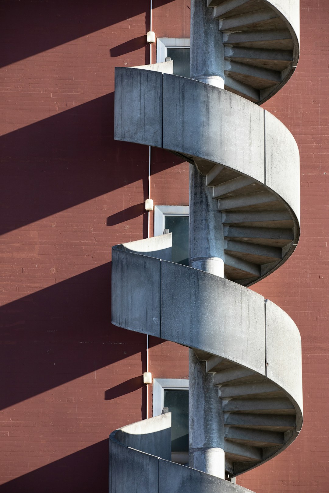 gray spiral stairs tower