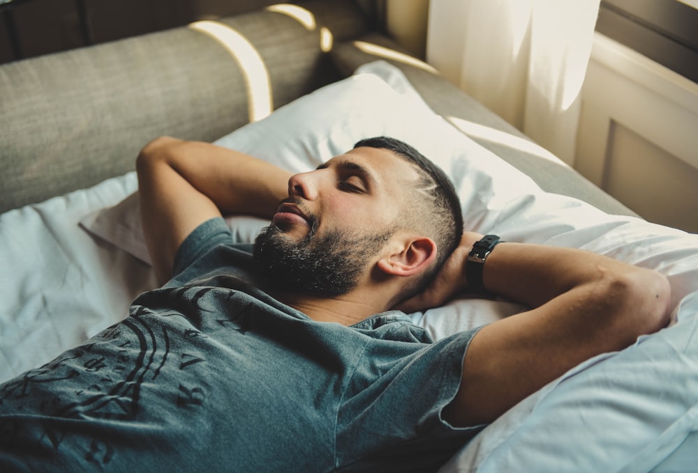 man lying on bed