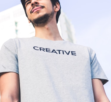 man in gray Creative crew-neck shirt