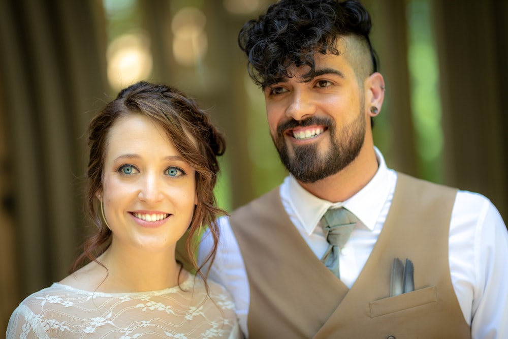 man and woman taking photo