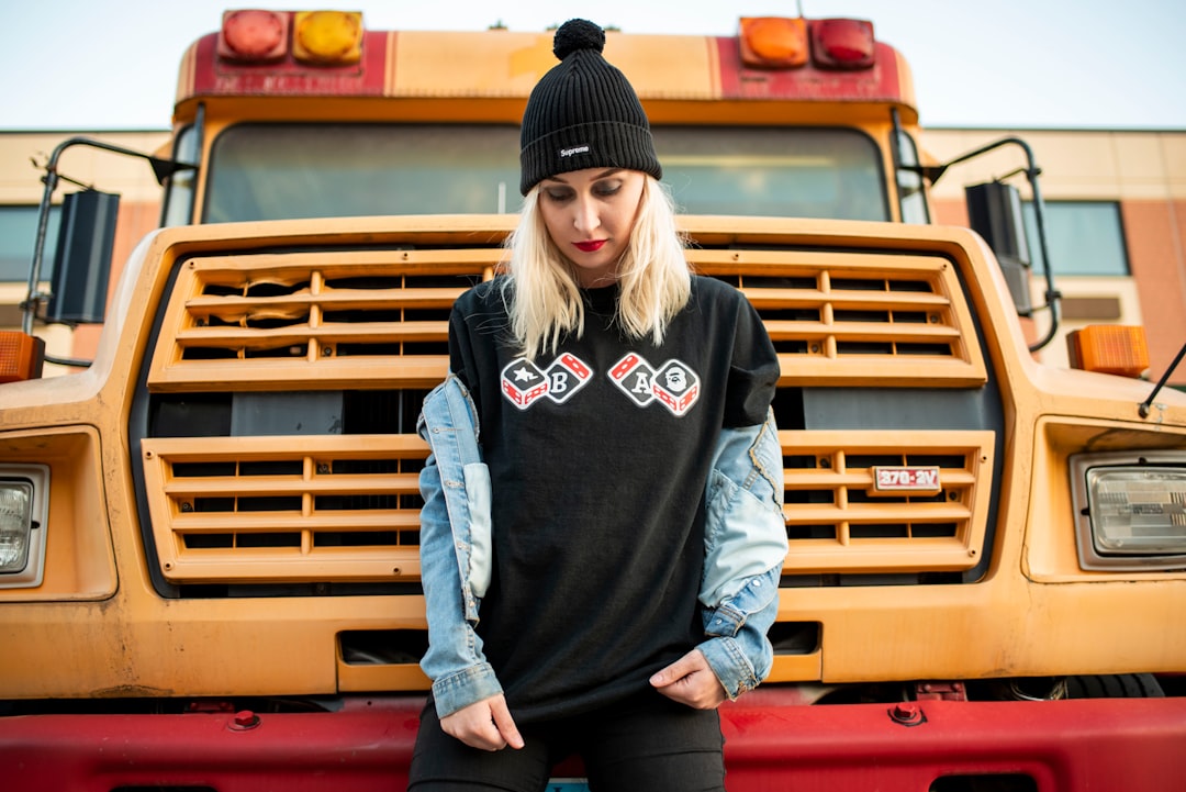 woman in front of truck