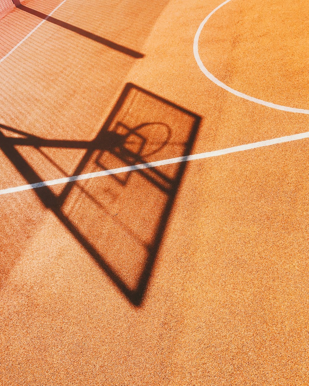 shadow of basketball hoop