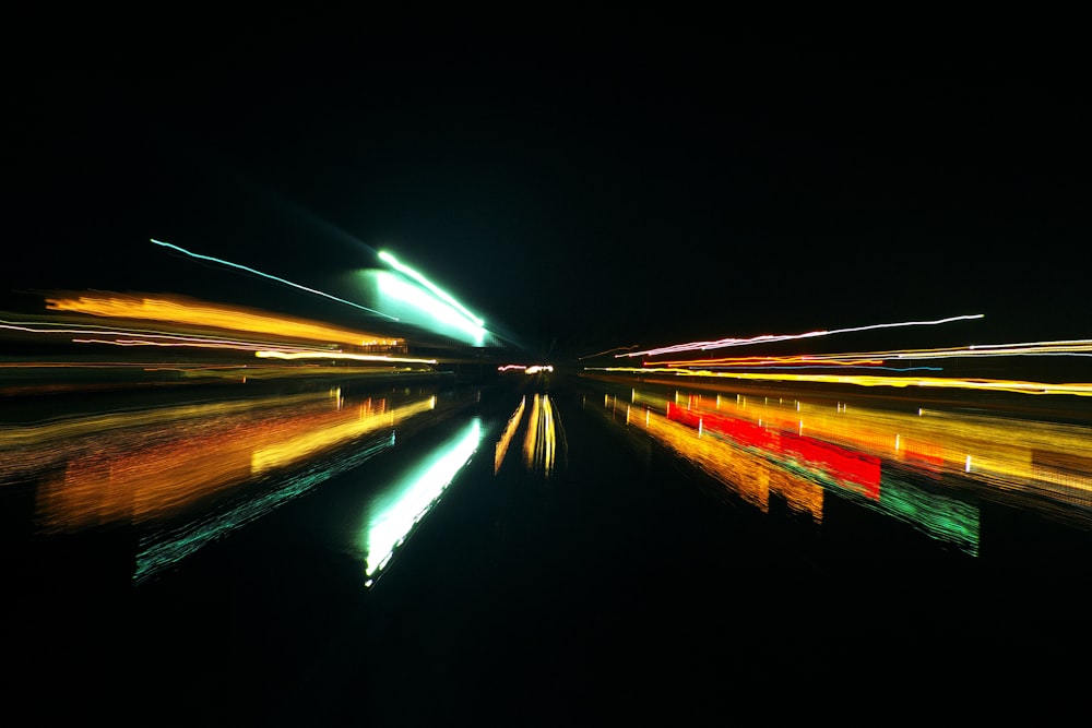 a long exposure photo of a river at night