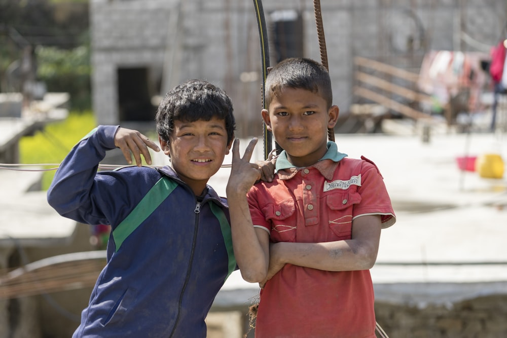 selective focus photography of two boys